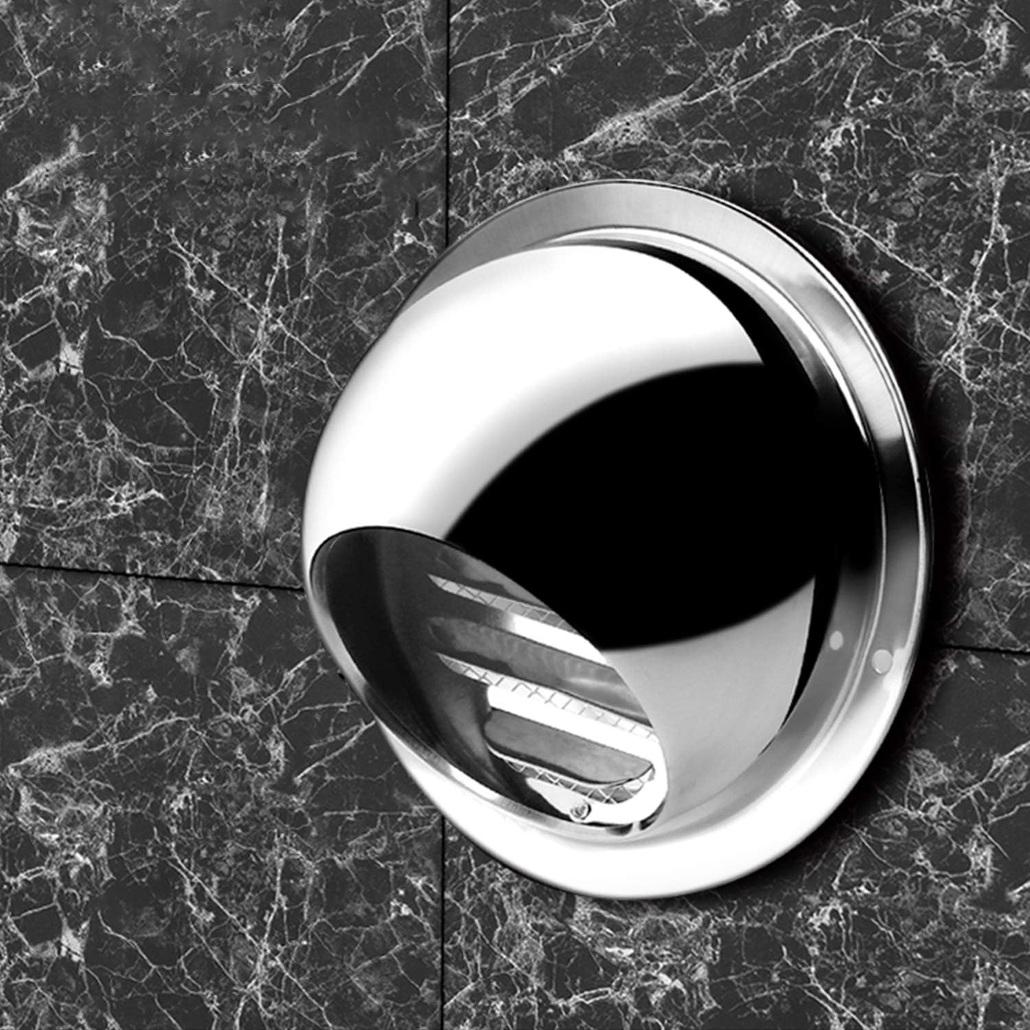 Stainless steel air vent cover installed on an exterior wall.